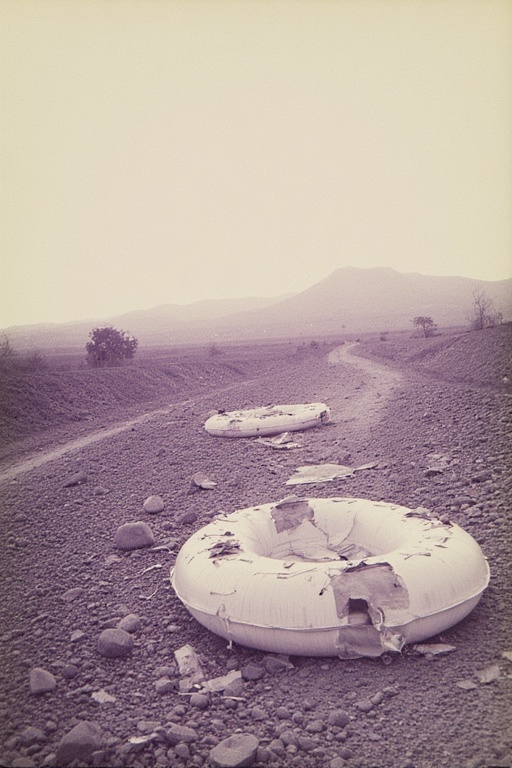 dreams forgotten on an inflatable life raft cover