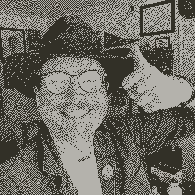 heavily dithered image of Jake giving a thumbs up