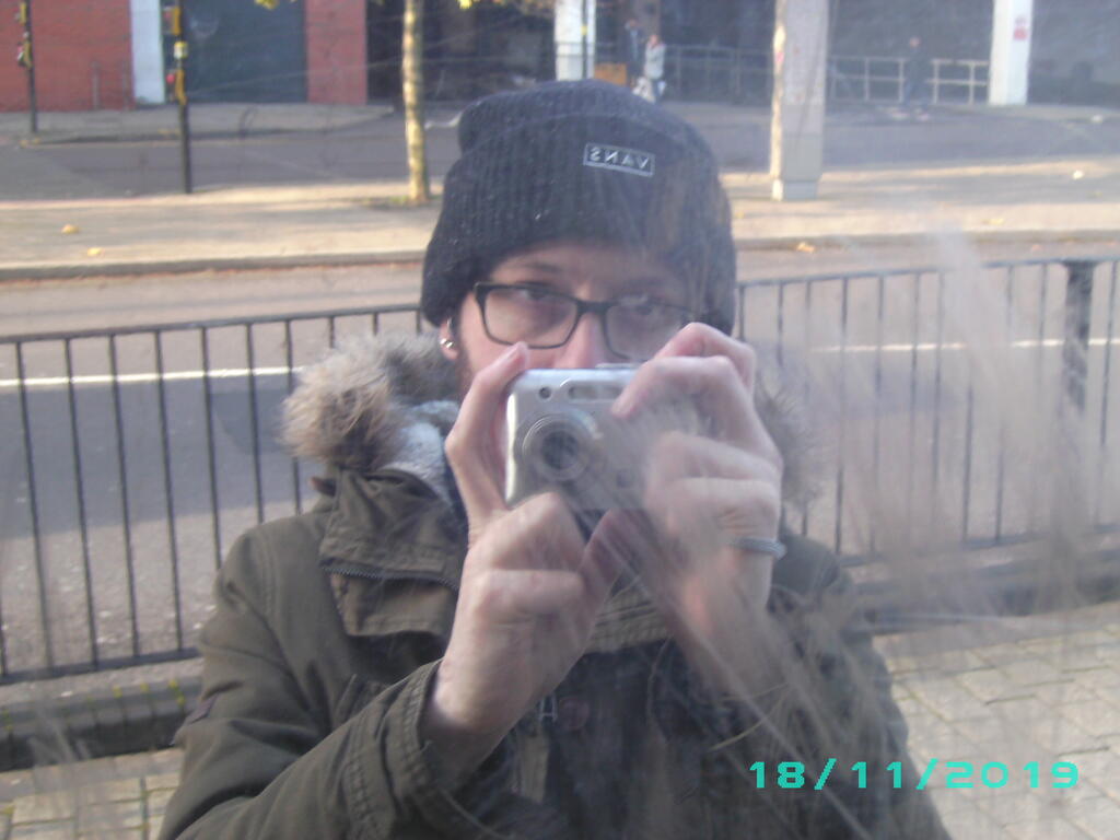 A mirror selfie of me from 2019 shot with a digital camera that cost me 50p.
