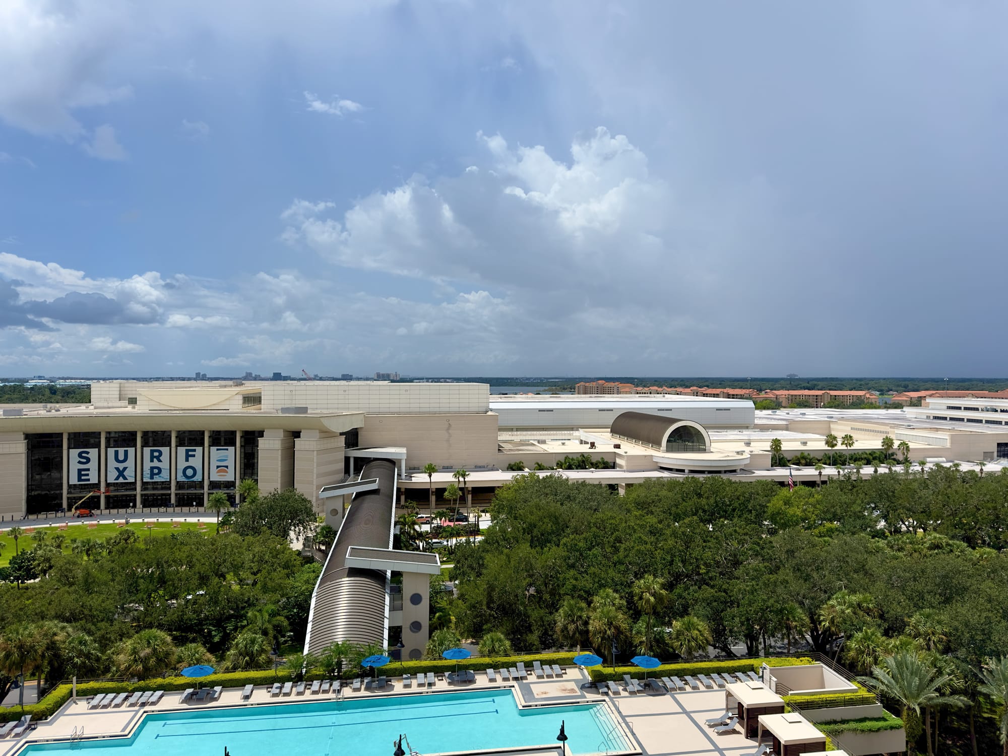 A view over one of the hotel pools to the convention center.