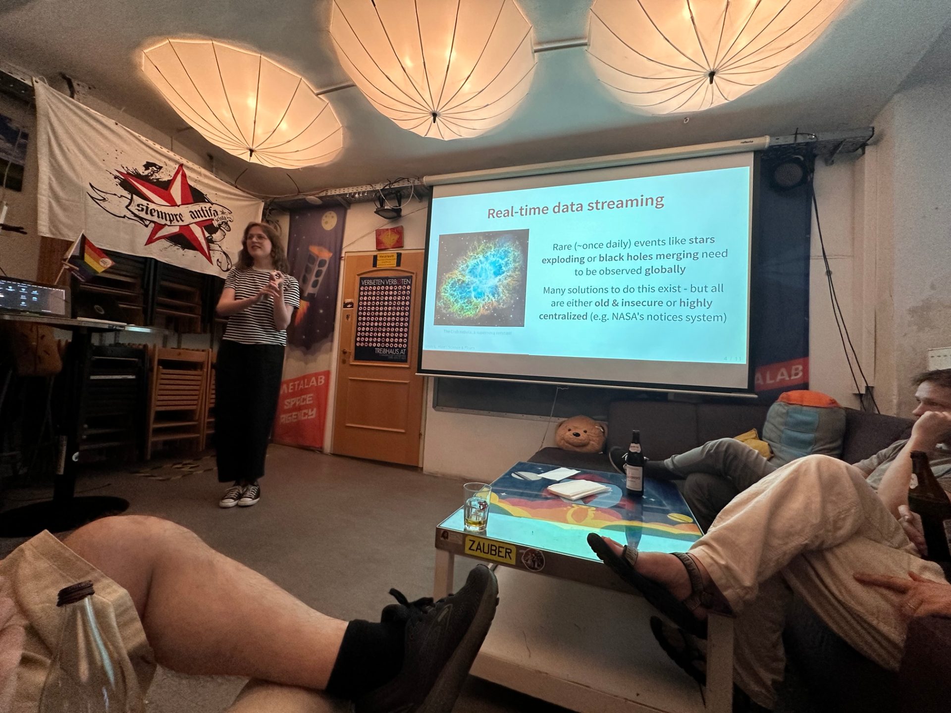 Emily giving a presentation on real-time data streaming of space phenomenon and how helpful that is to the larger science community.