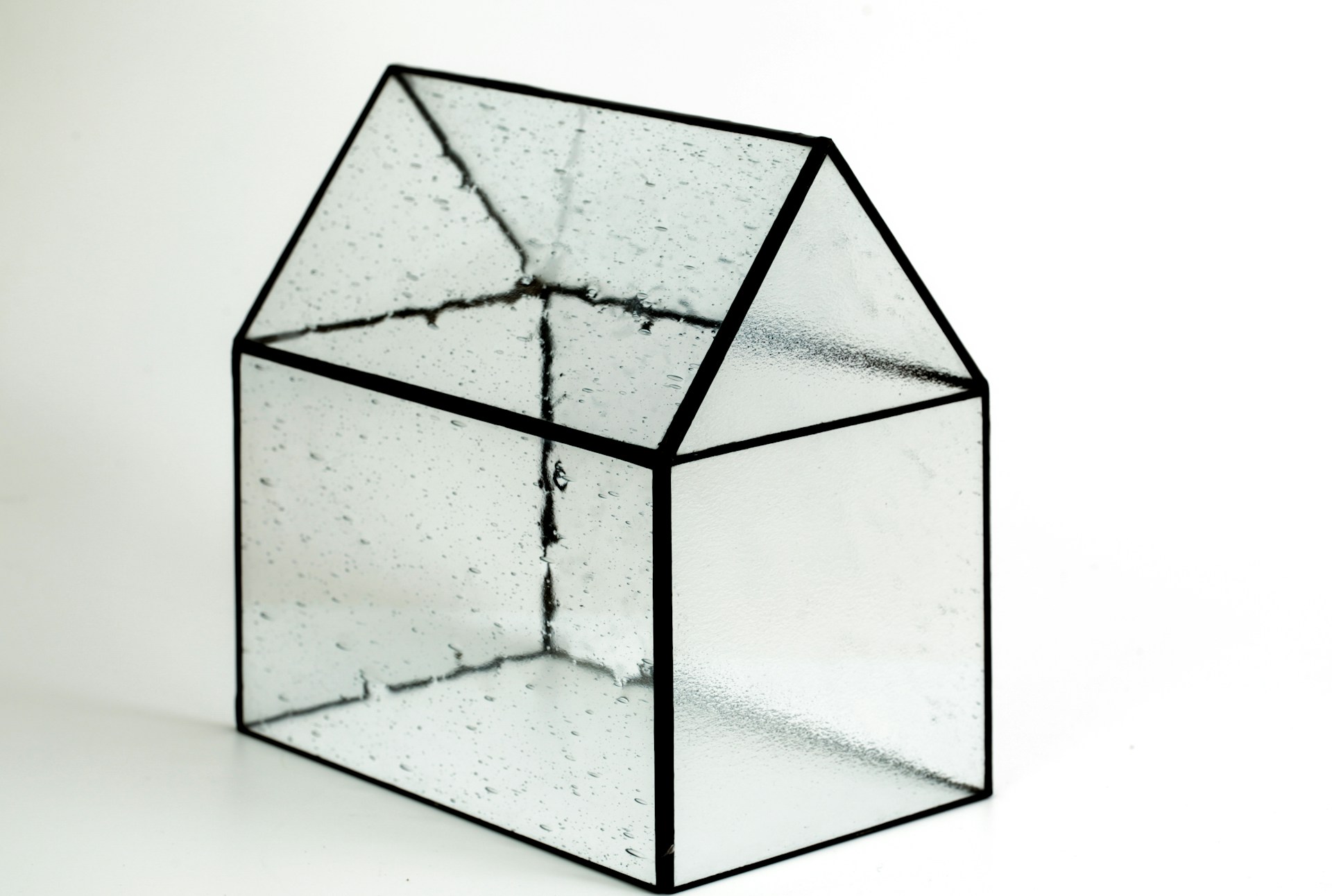 Photograph of a handmade glass house taken by Wilhelm Gunkel.