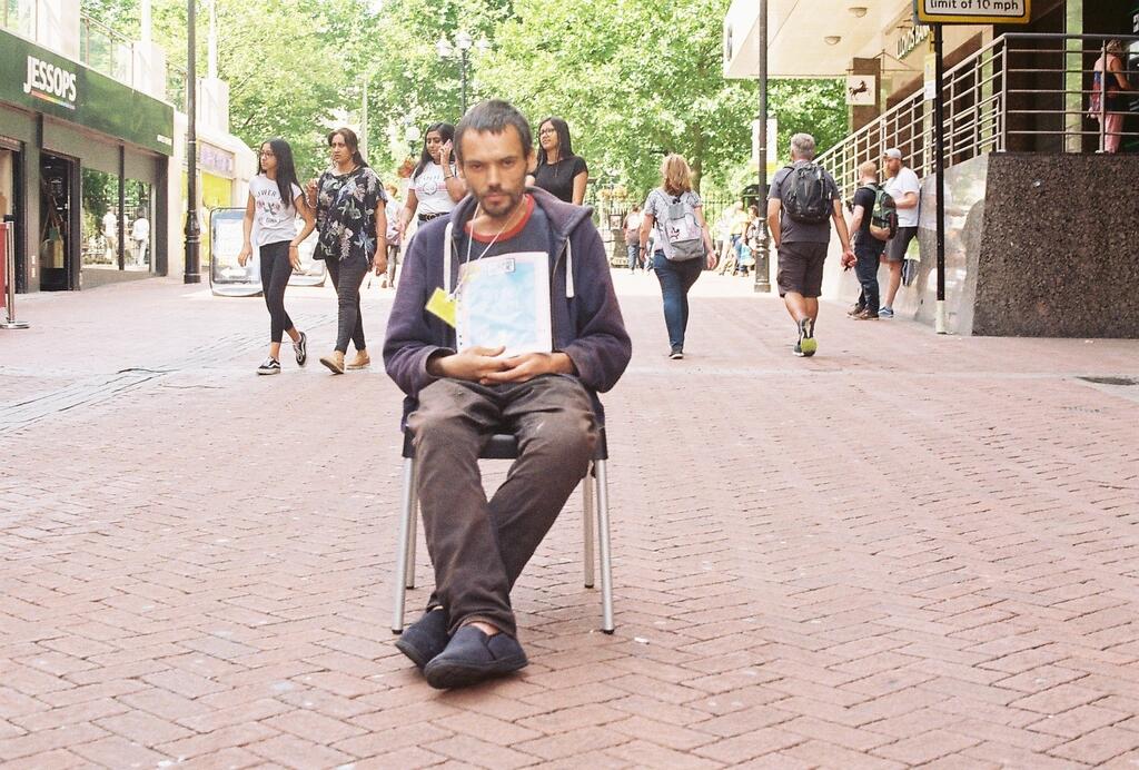 A Big Issue seller in Birmingham city centre.