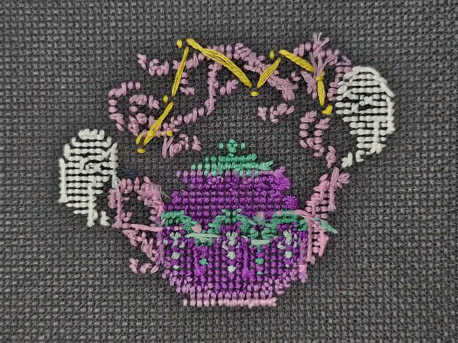 The backside of the teapot cross-stitch.