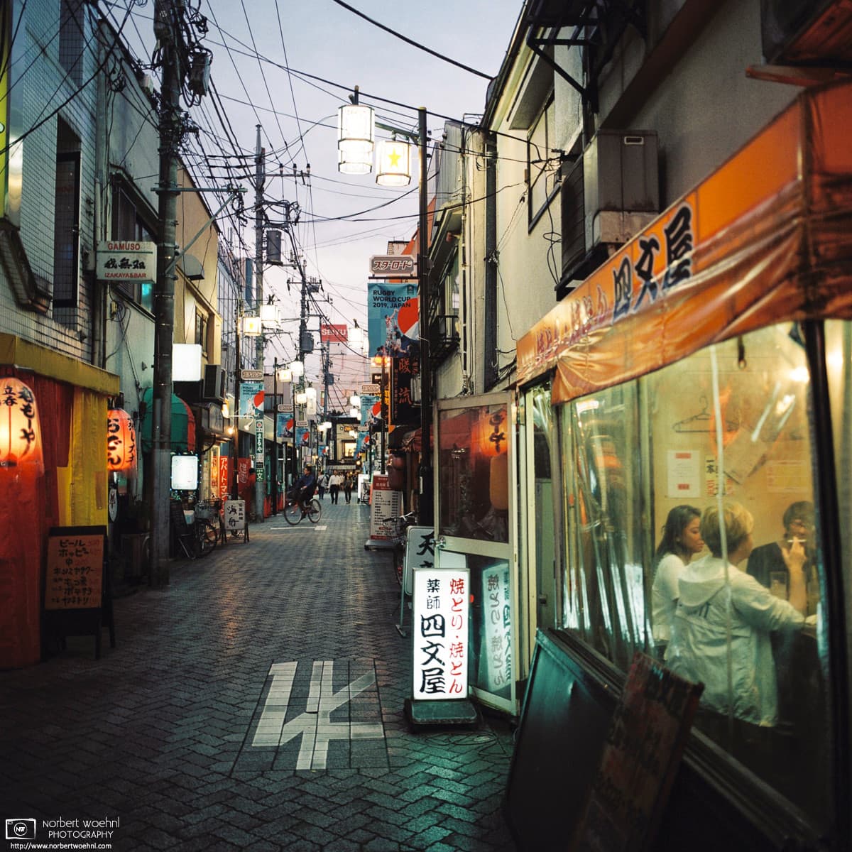 Late-afternoon mood along a lane of bars and pubs in Asagaya, Tokyo.