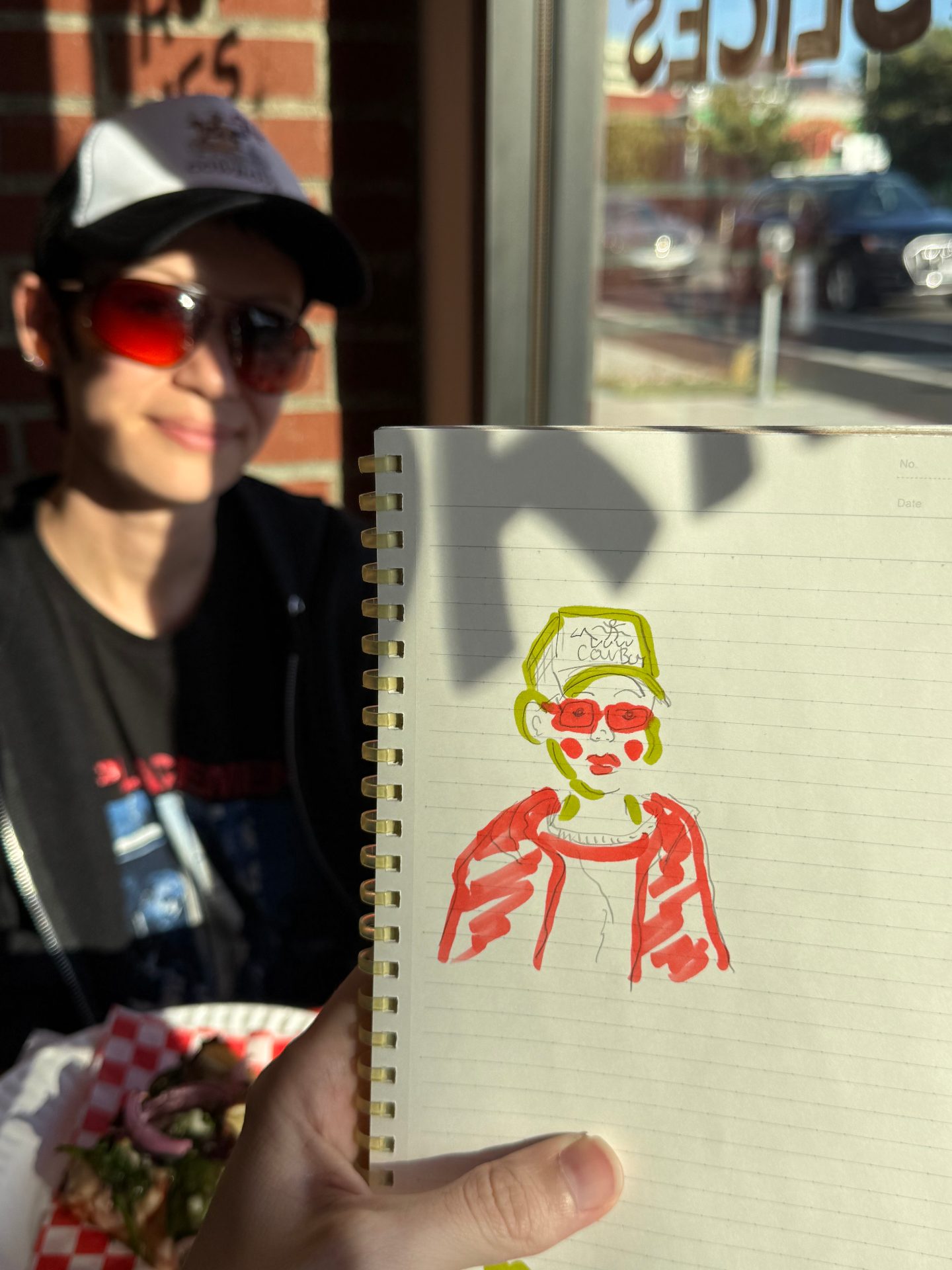 fig wearing sunglasses and a hat behind a drawing of fig wearing sunglasses and a hat.
