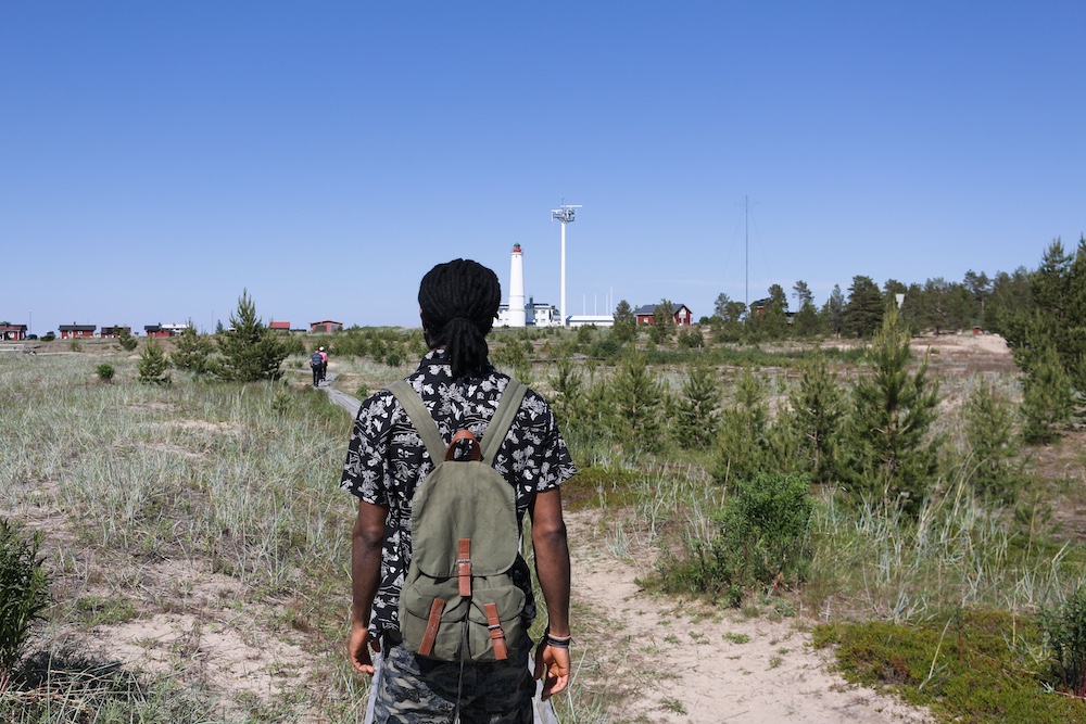 Husband on sand dunes of Hailuoto island near Oulu, Finland