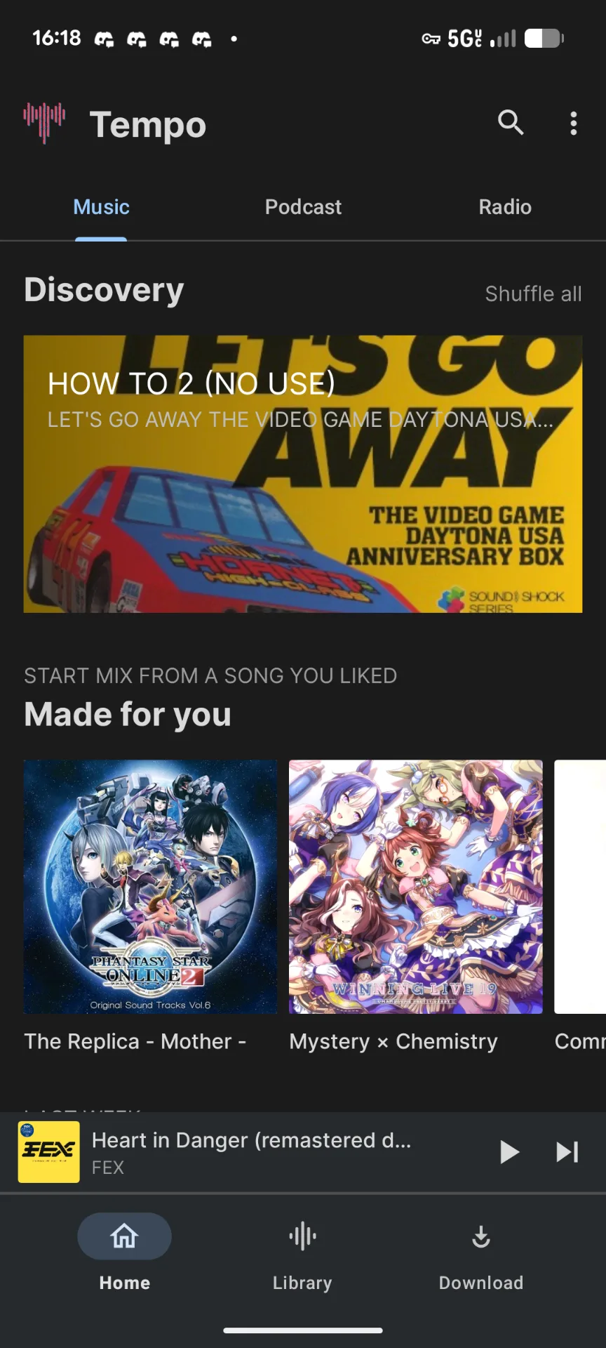A mobile music player, displaying several albums.