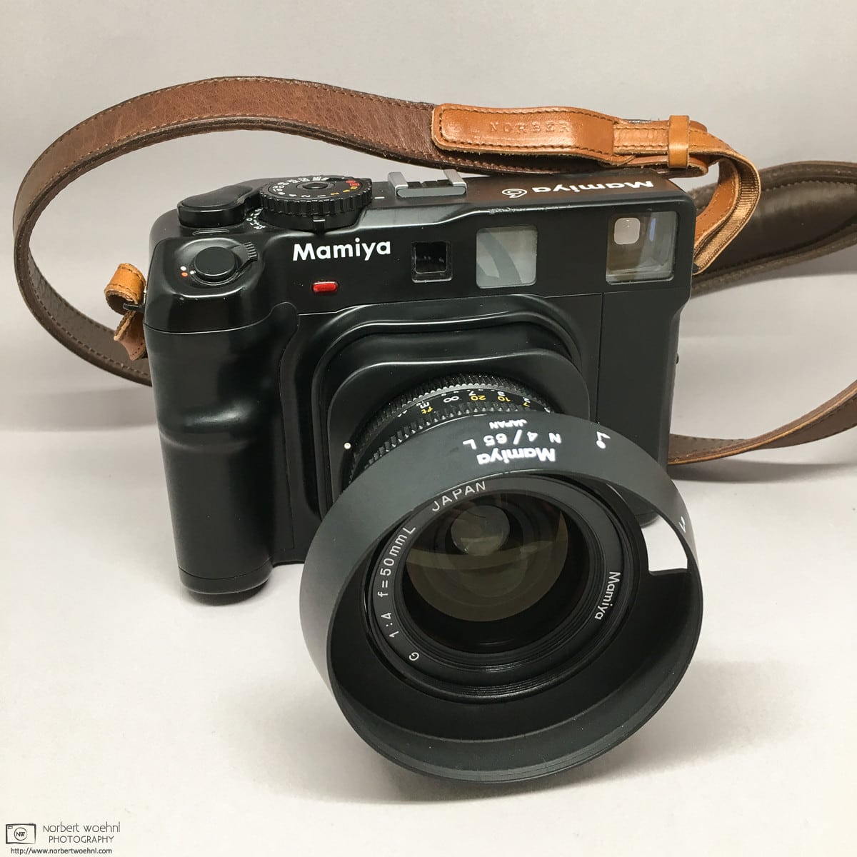 My Mamiya 6 with 50mm f/4.0 lens and leather strap.
